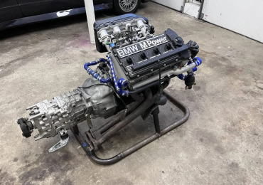 BMW 2.3-liter S14B inline-four and Getrag five-speed manual gearbox